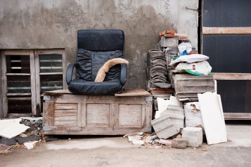 Homeowner reviewing cleared loft space in Goldersgreen